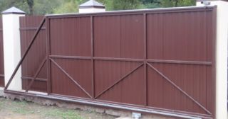 Купить откатные ворота из профнастила Отрадный, цена от 1734 руб.